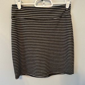 High wasted fitted skirt. Black with white stripes. Never worn before!